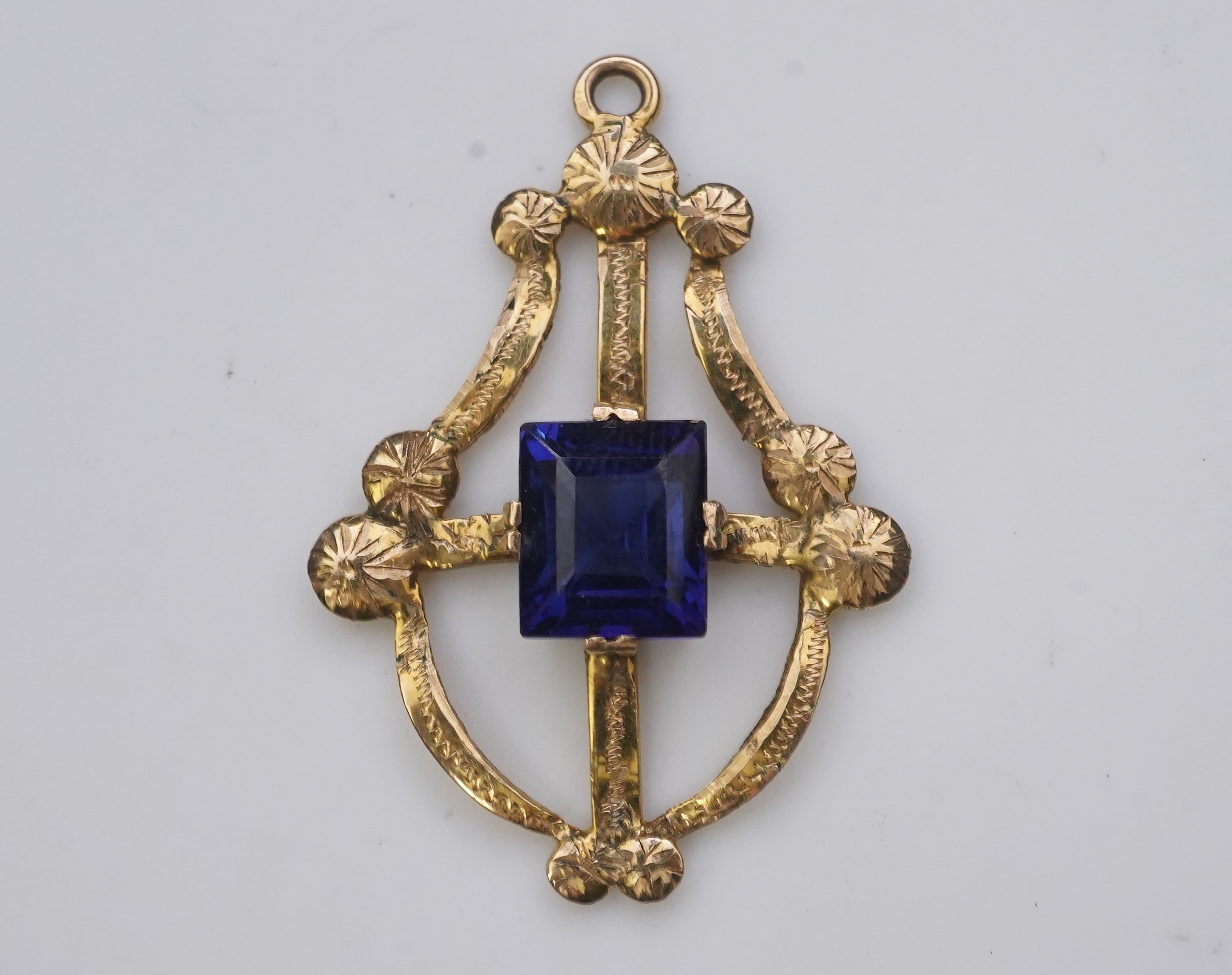 A collection of three brooches and a pendant, 19th and 20th century